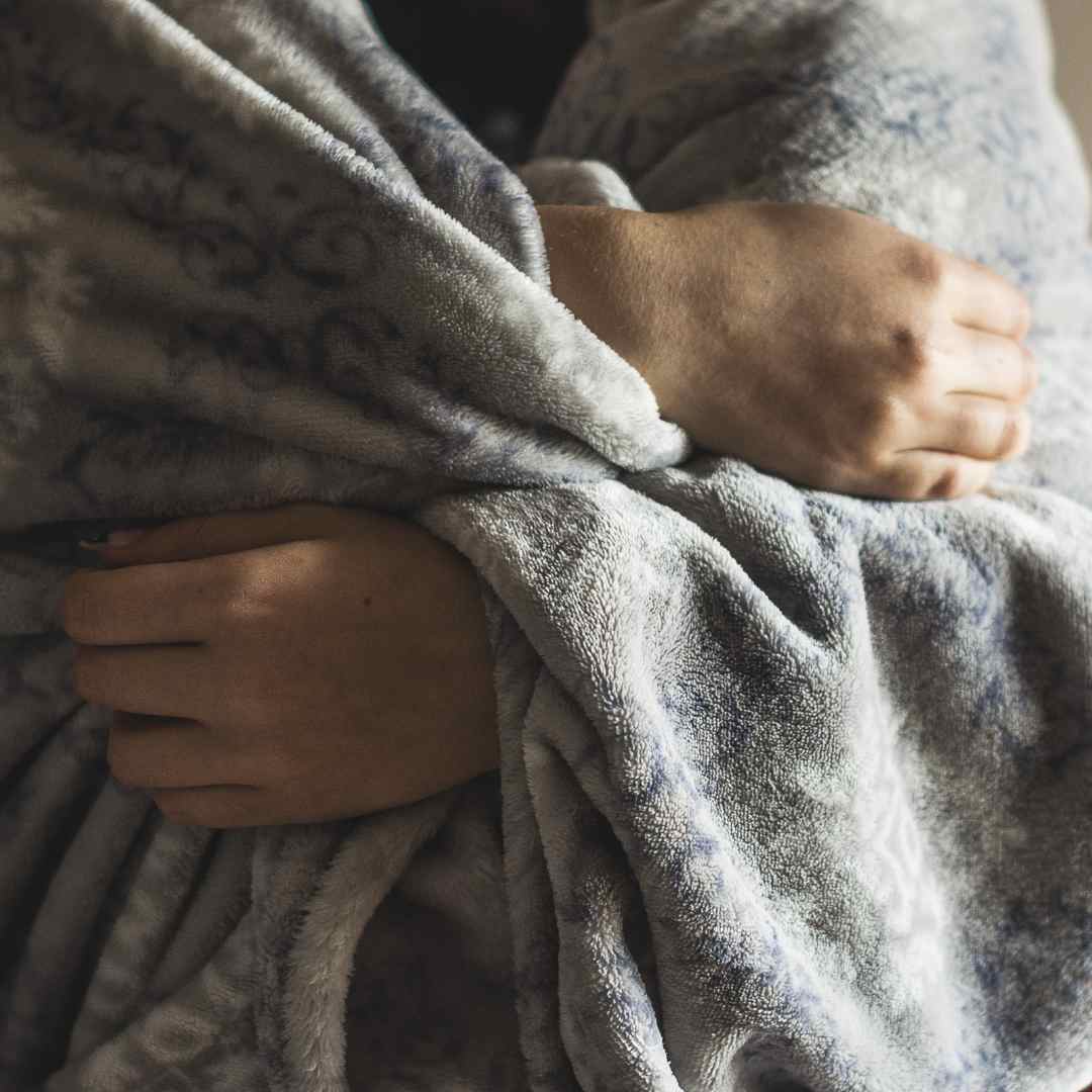 a person wrapped in blanket